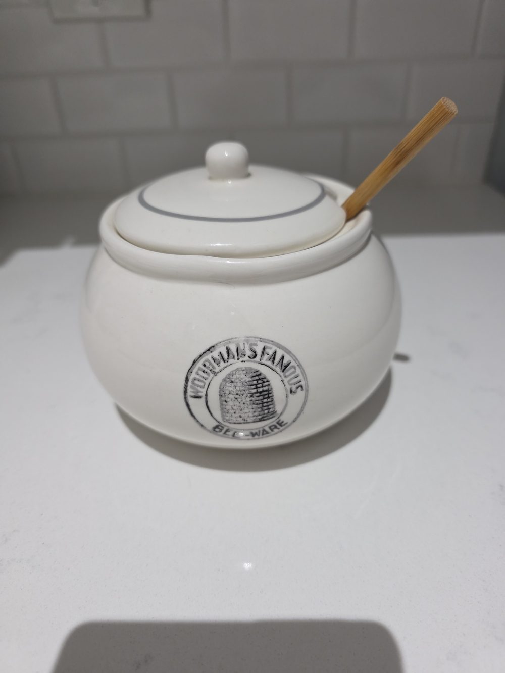 Creative Co-Op Woodmans Famous White Ceramic Honey Jar with Signature Marking